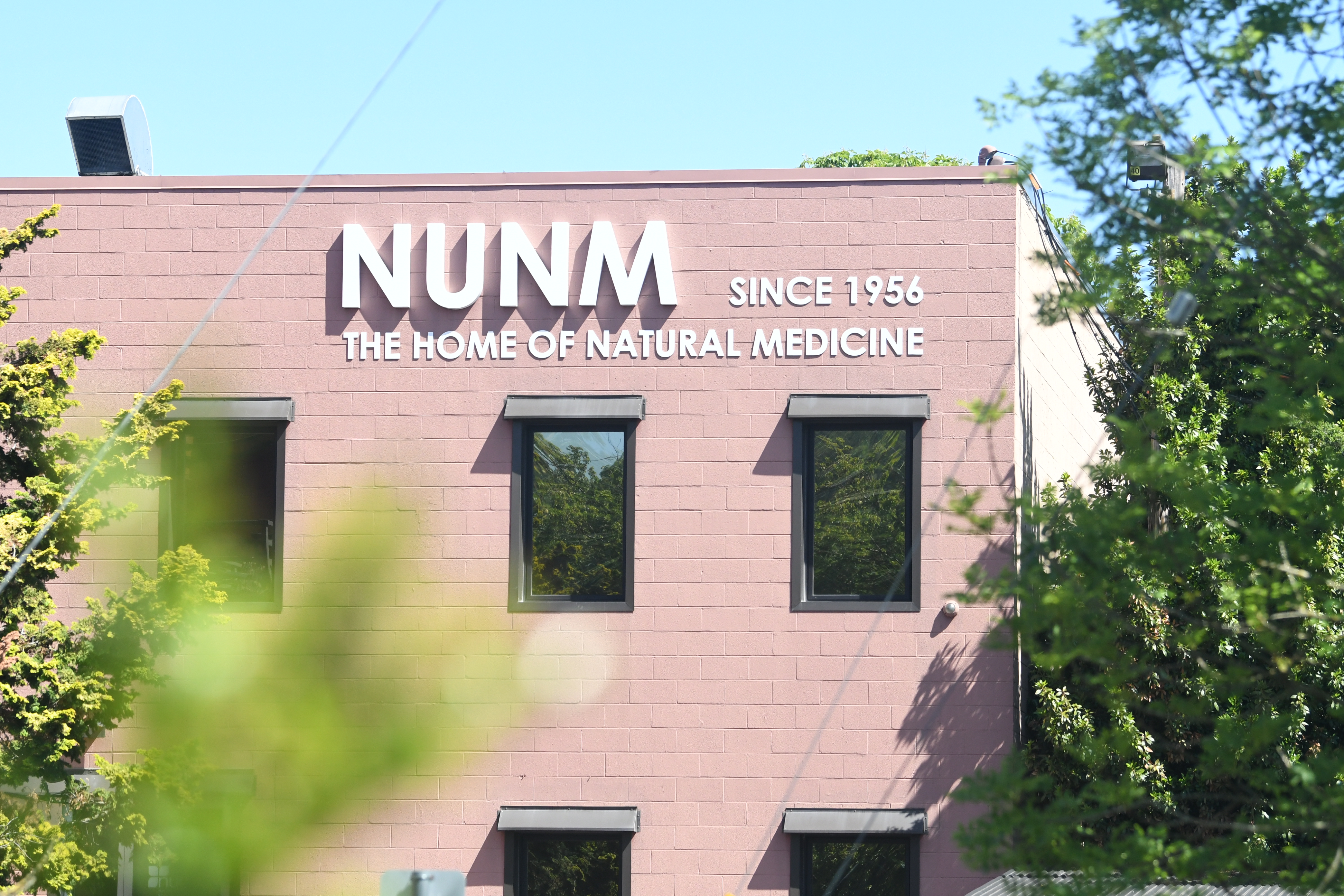 NUNM campus sign