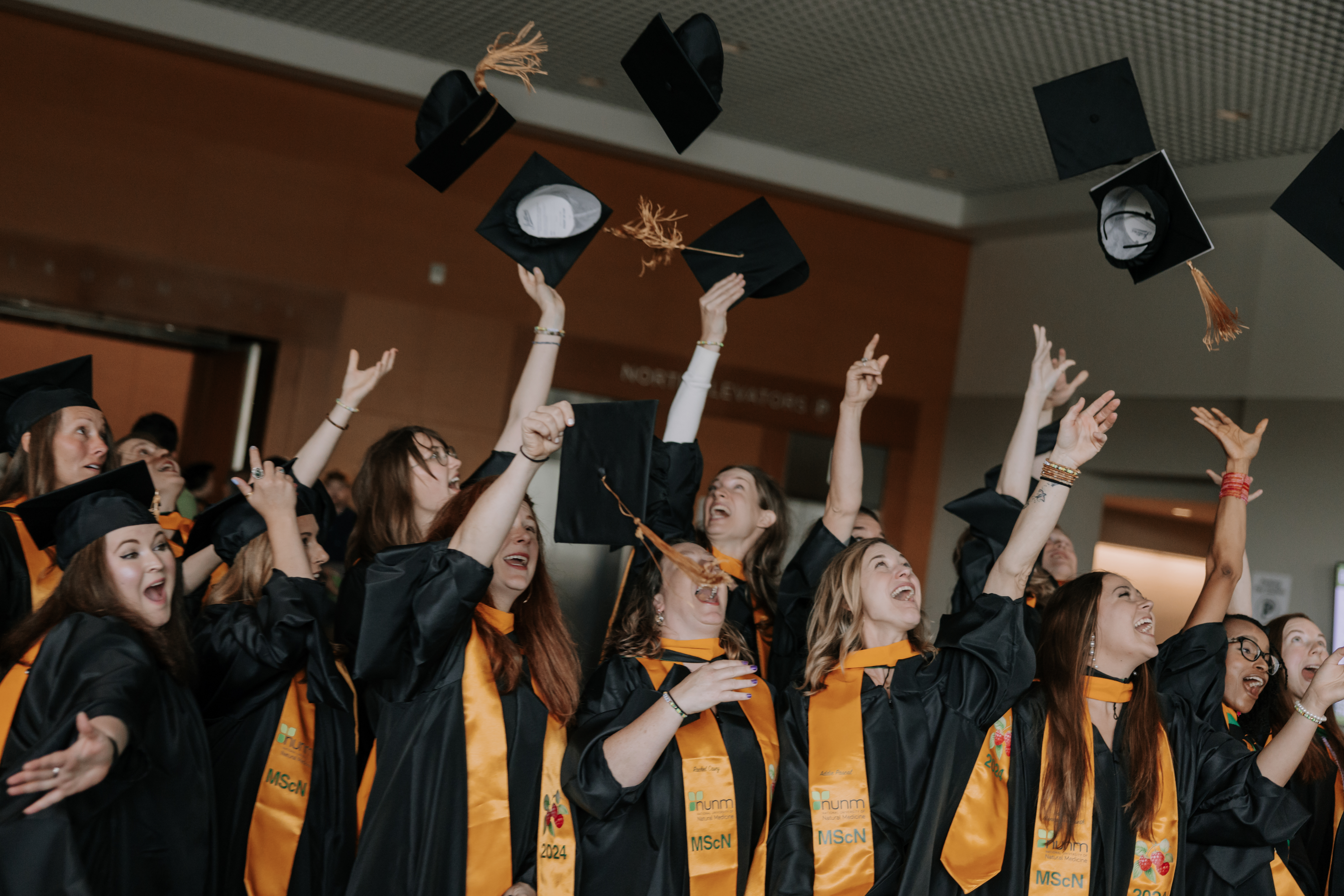 A group of NUNM Graduates celebrating